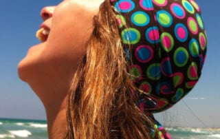 laughing with nammu sun protective swim cap