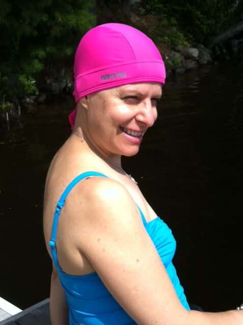 woman pink chemo swim hat